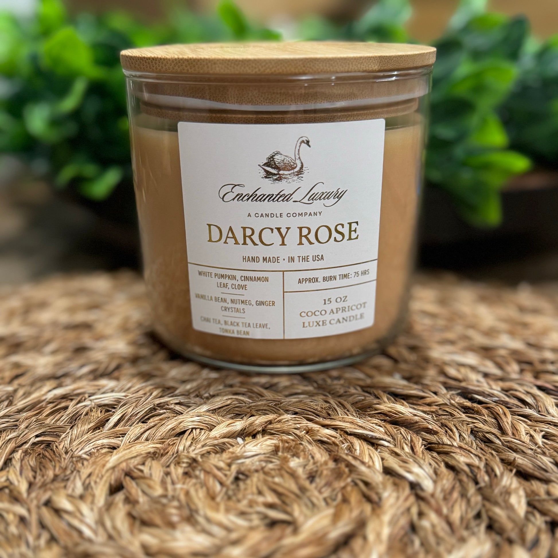 a darcy rose candle sits on a table