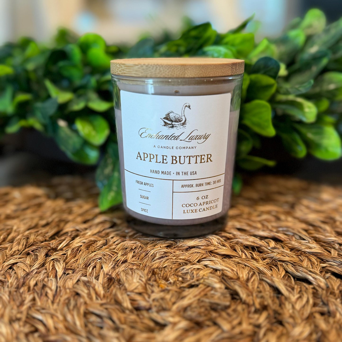 an apple butter candle sitting on a table