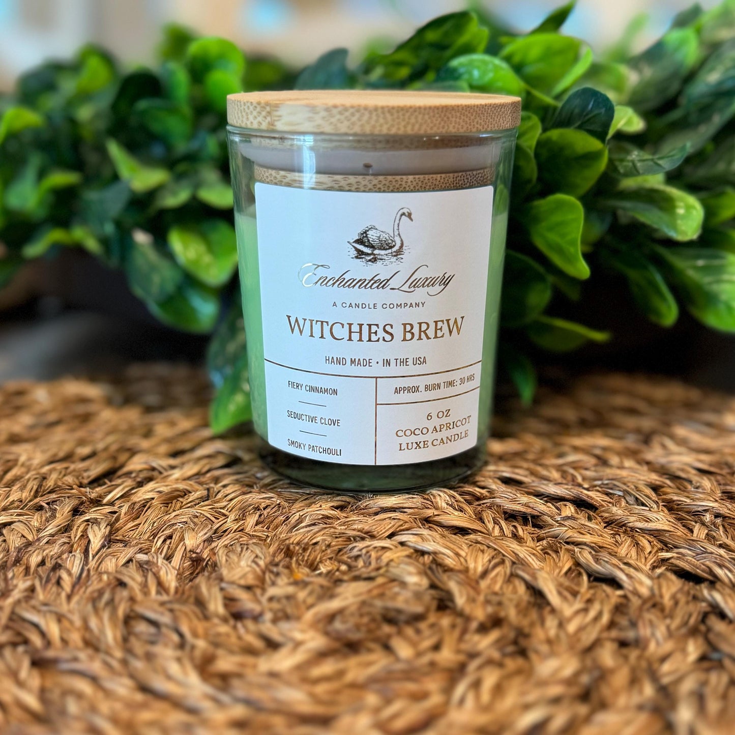 a witches brew candle sitting on a table